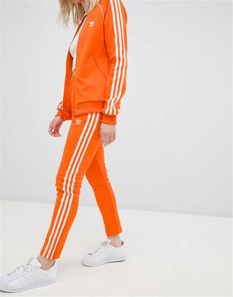 adidas schoenen groen oranje|Adidas originals broek.